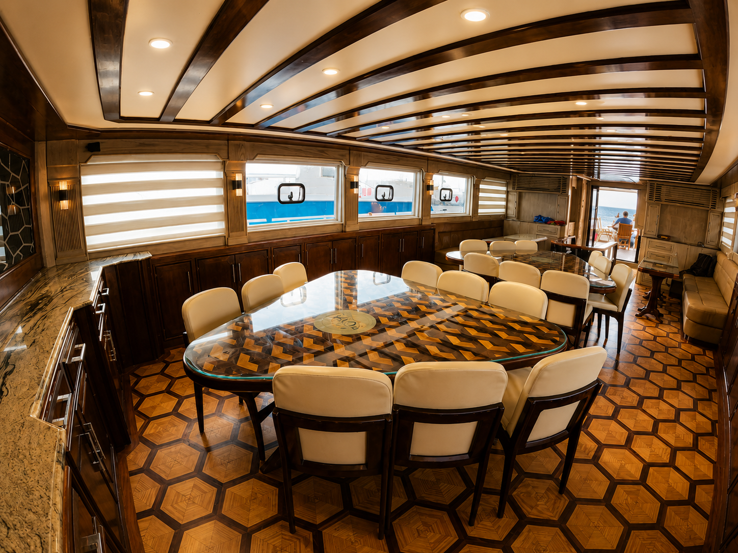 Air-conditioned dining salon with comfortable seating onboard a Red Sea dive boat