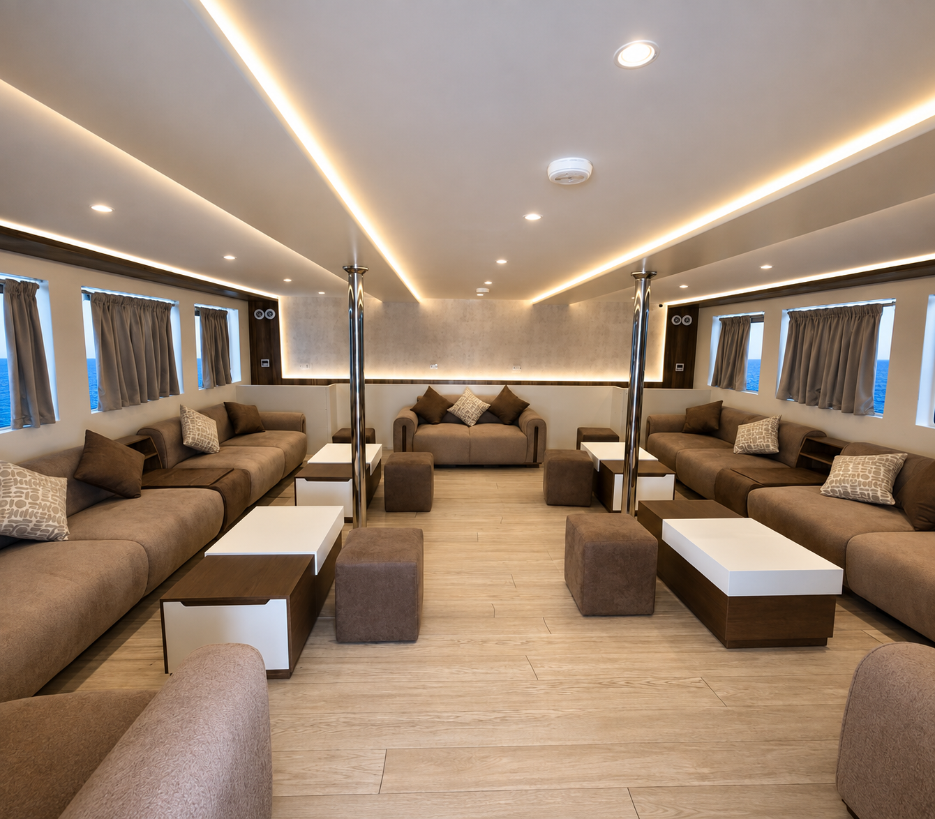 Air-conditioned salon aboard the C Echo II liveaboard with lounge seating