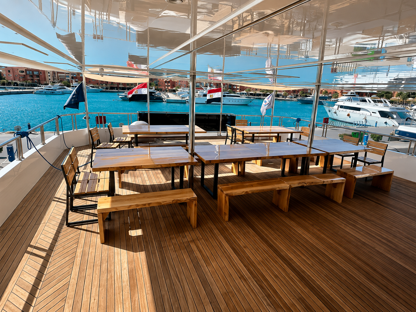 Outdoor dining deck laid for a meal