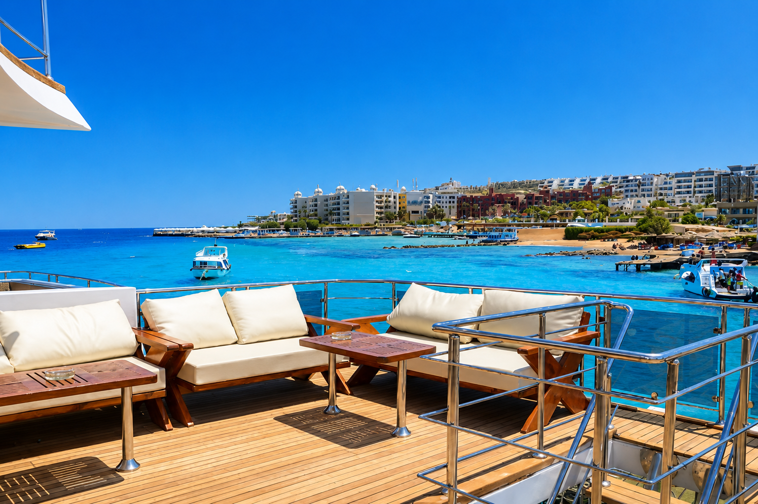 Outdoor lounge with teak decking and views across the Red Sea