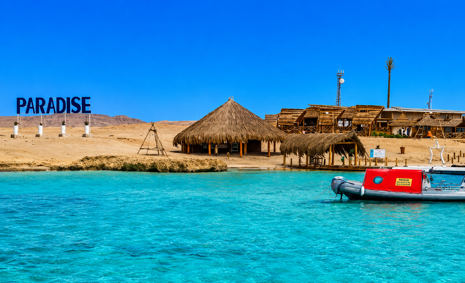 Paradise beach on Giftun Island with clear turquoise water and traditional beach huts near Hurghada