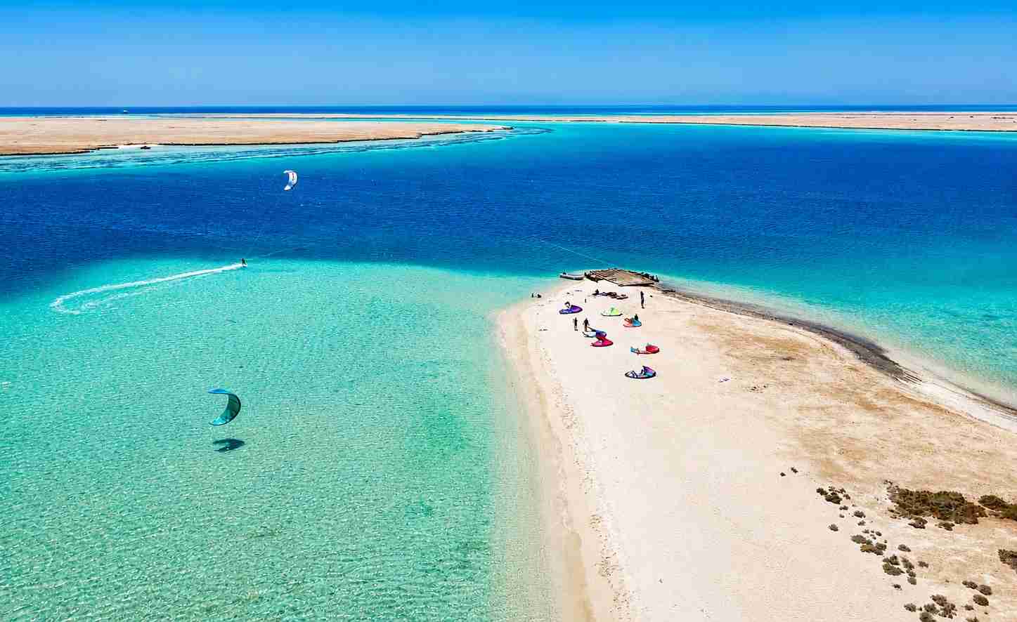 Aerial view of a Red Sea kite liveaboard lagoon with shallow water and white sandy islands