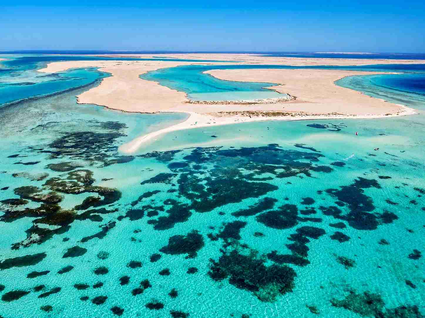 Aerial view of shallow lagoons, coral reefs and sandy islands in the Egyptian Red Sea