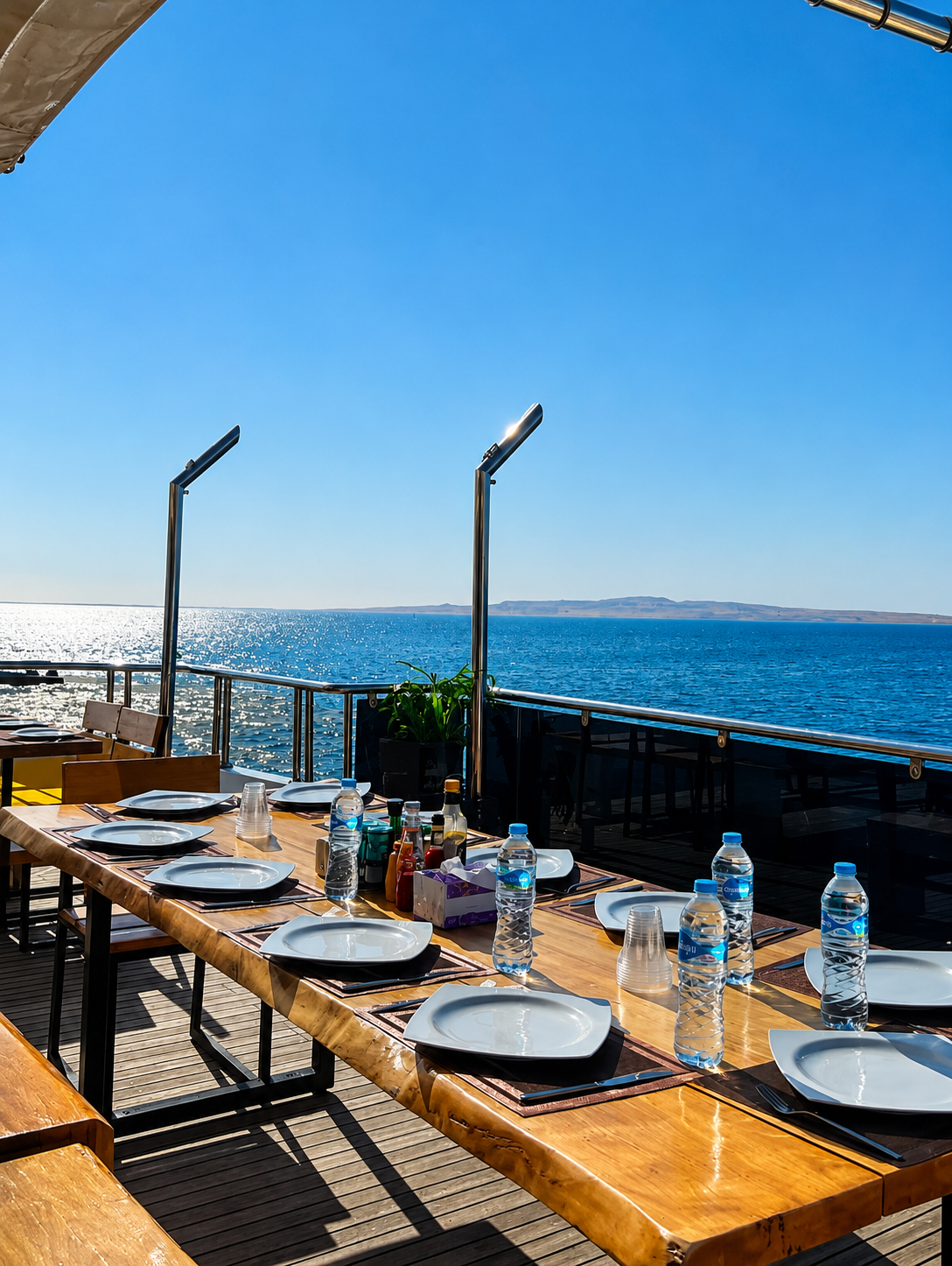 Outdoor table set for dinner on the M/Y Sea Fox