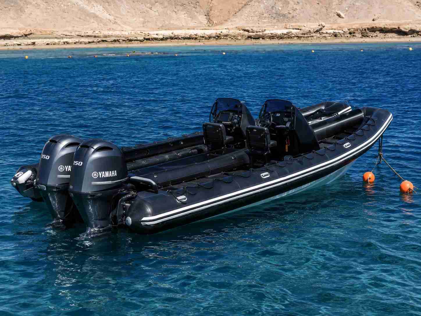 Rigid inflatable dive boat providing diving safety cover on the surface