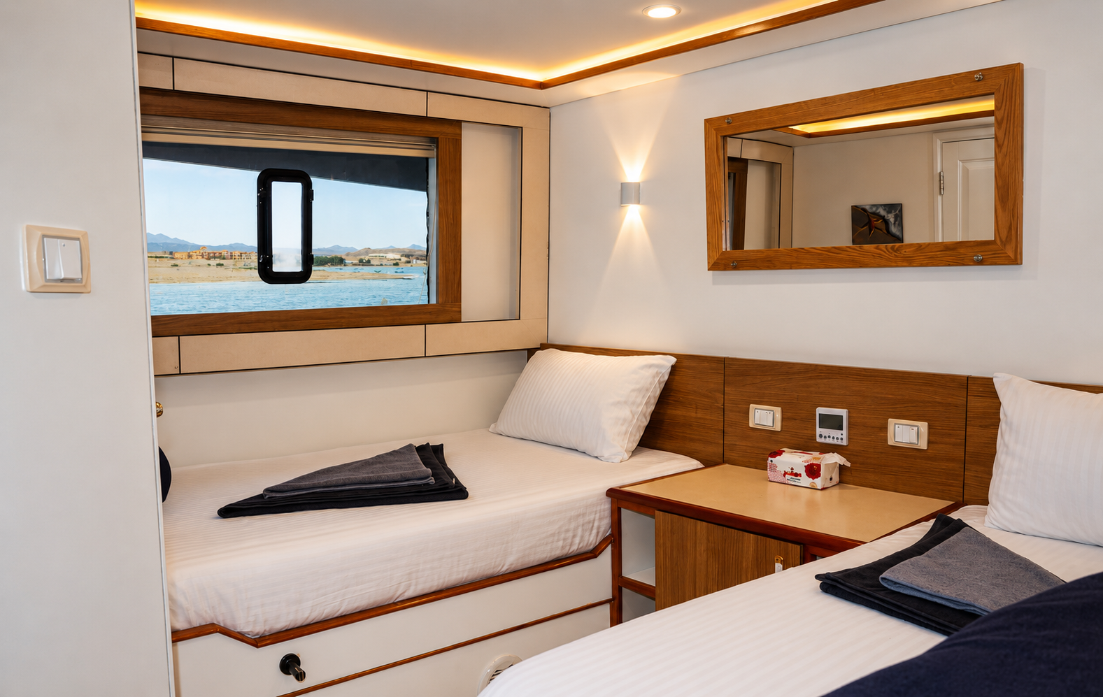 Sea view cabin on the main deck with a window onto the water