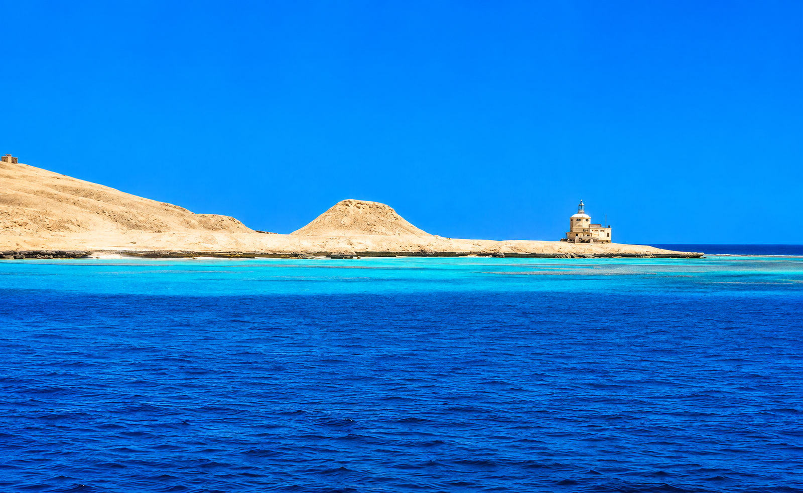 Small Giftun Island with its lighthouse and turquoise Red Sea water near Hurghada