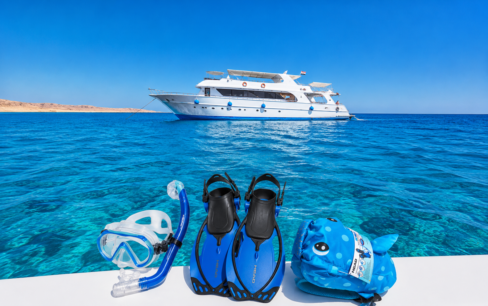 Snorkeling mask, snorkel, fins and a flotation vest ready for a Red Sea boat trip