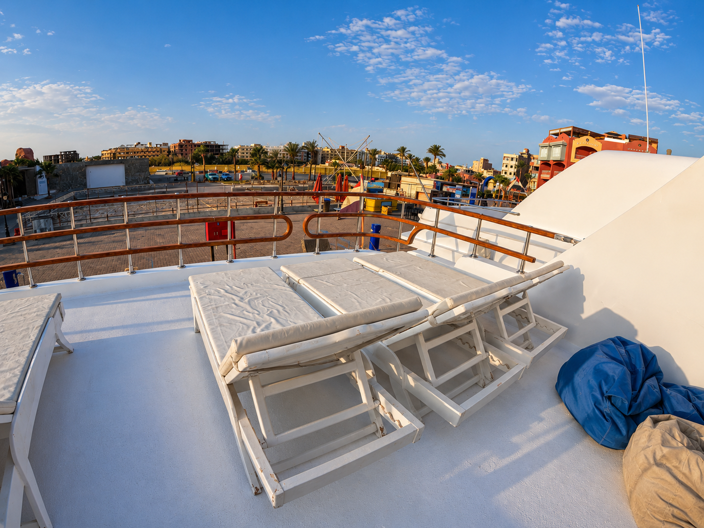 Spacious sun deck with comfortable loungers onboard a Red Sea diving boat