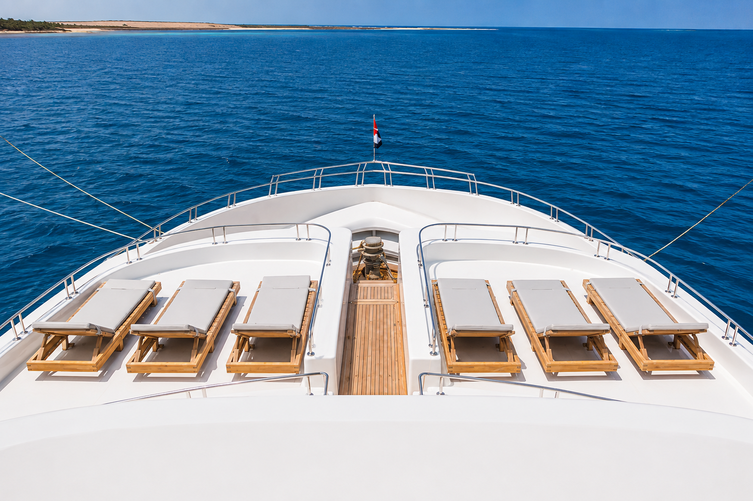 Sun beds lined up on the foredeck