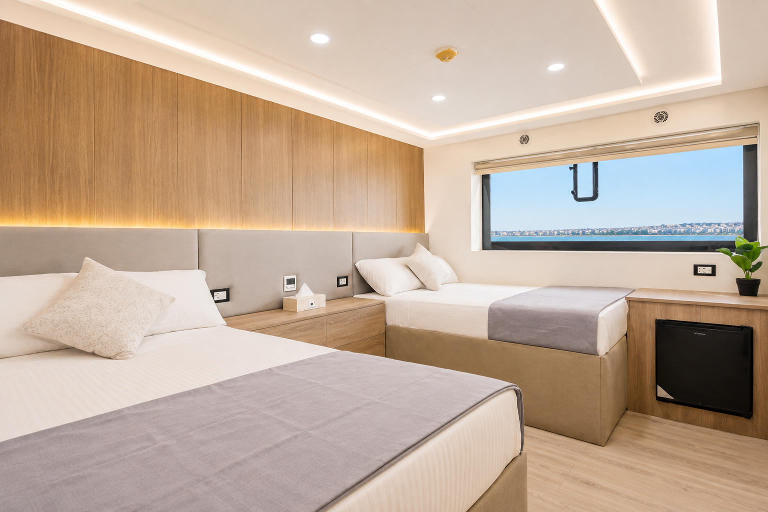Twin cabin with two separate beds for dive partners