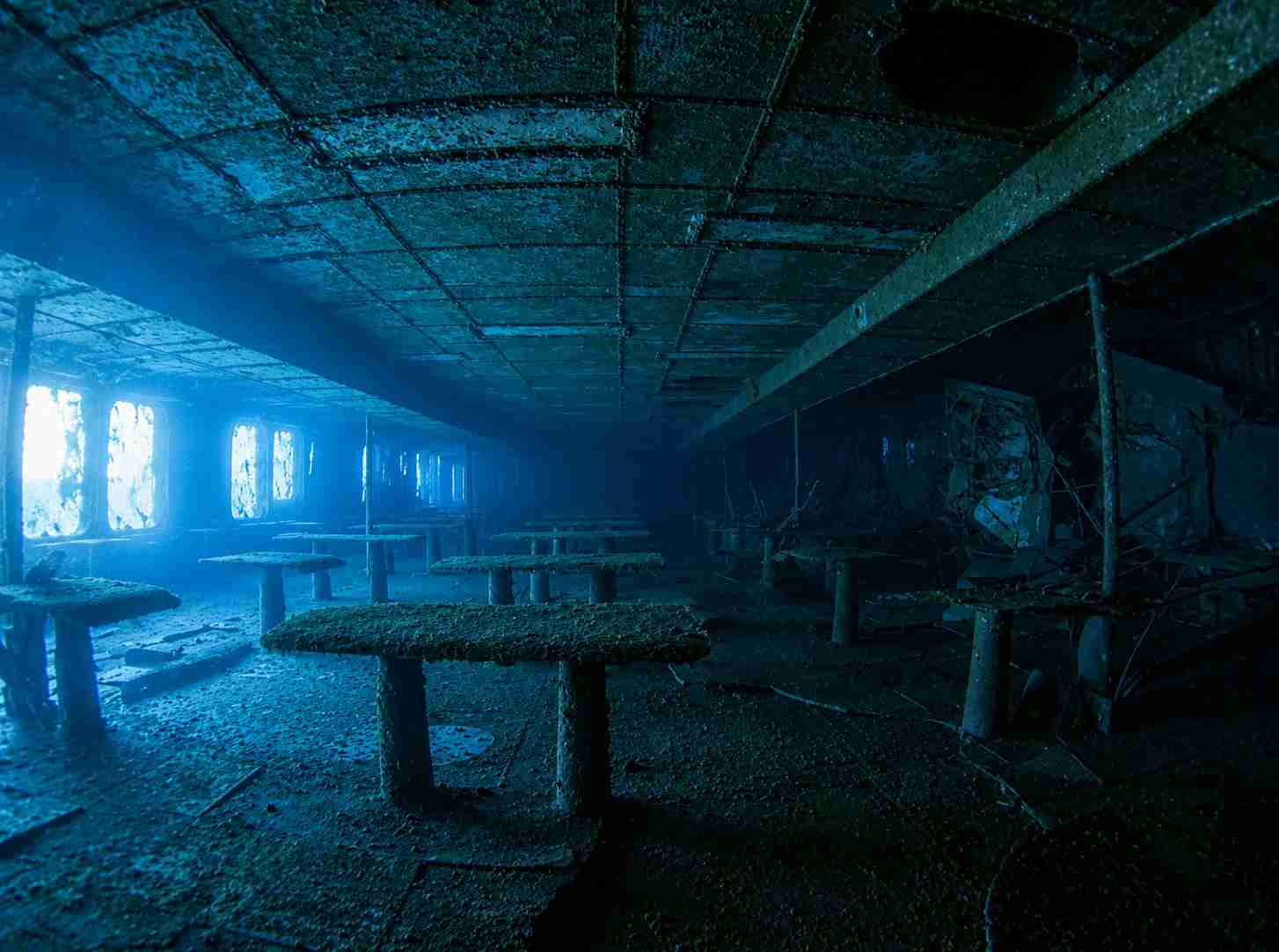 The restaurant interior, silted and still