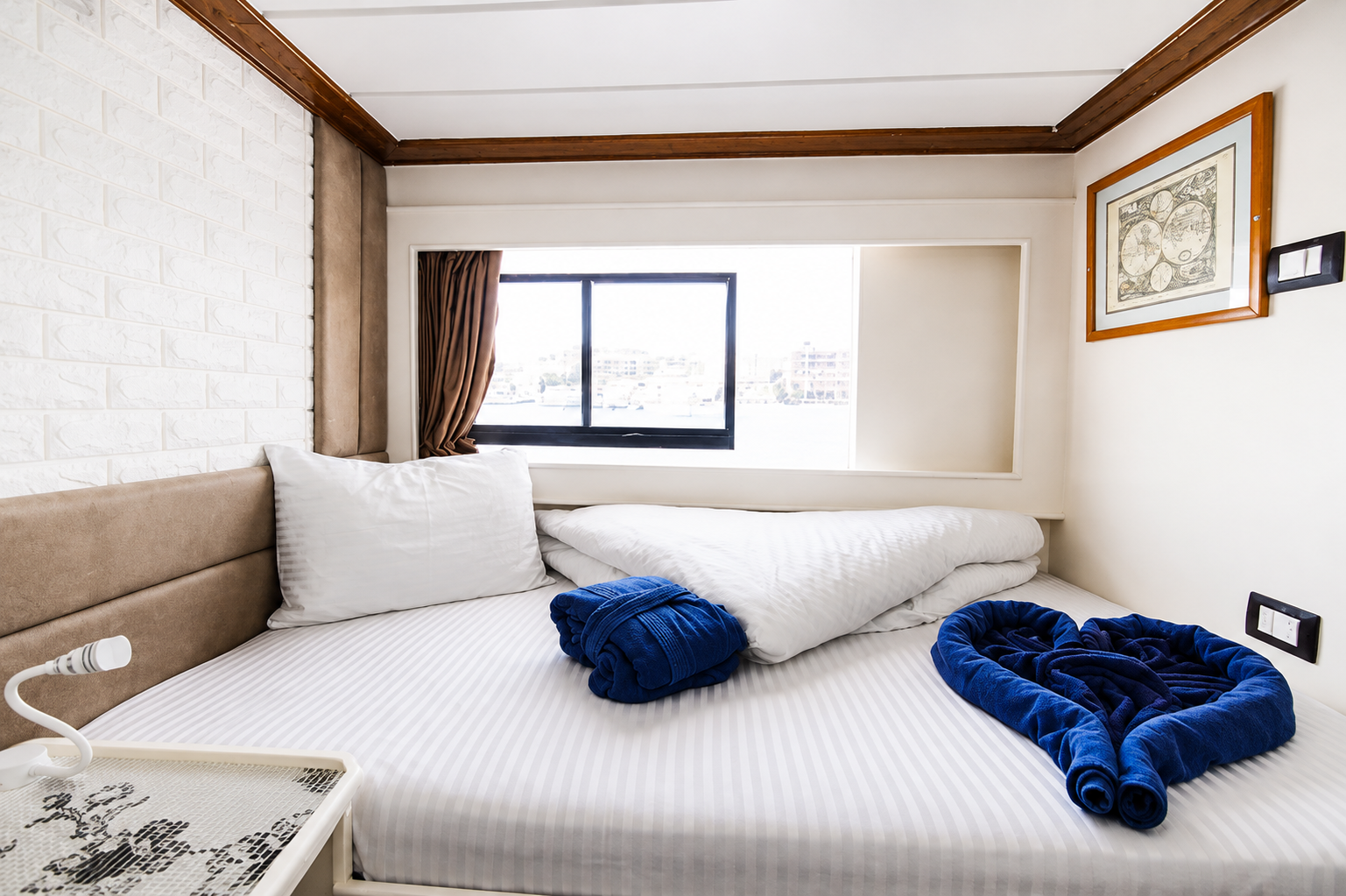 Sun deck cabin aboard the Star Jet liveaboard with a double bed