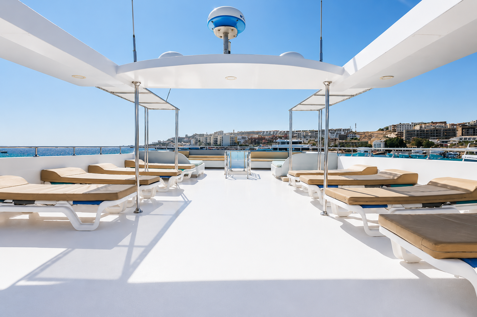 Upper deck lounge with sun loungers and open views