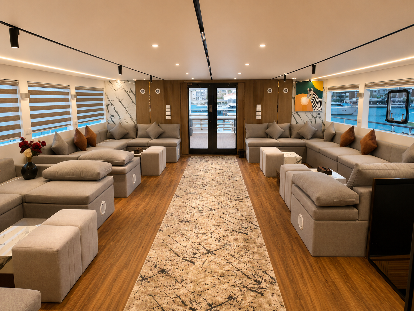 Indoor lounge with sofas and wide windows