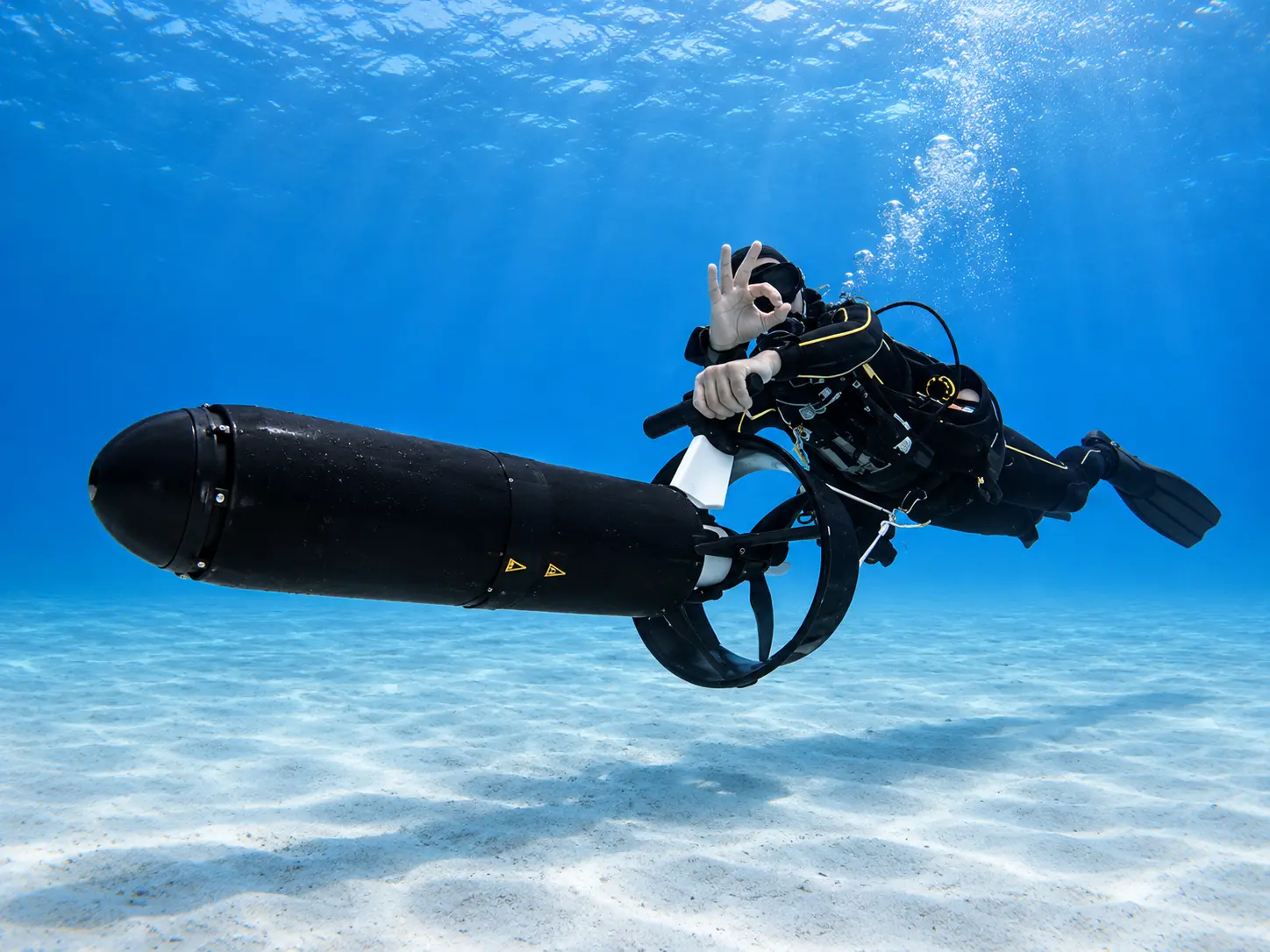PADI DPV Scooter Diver student under power on a training dive