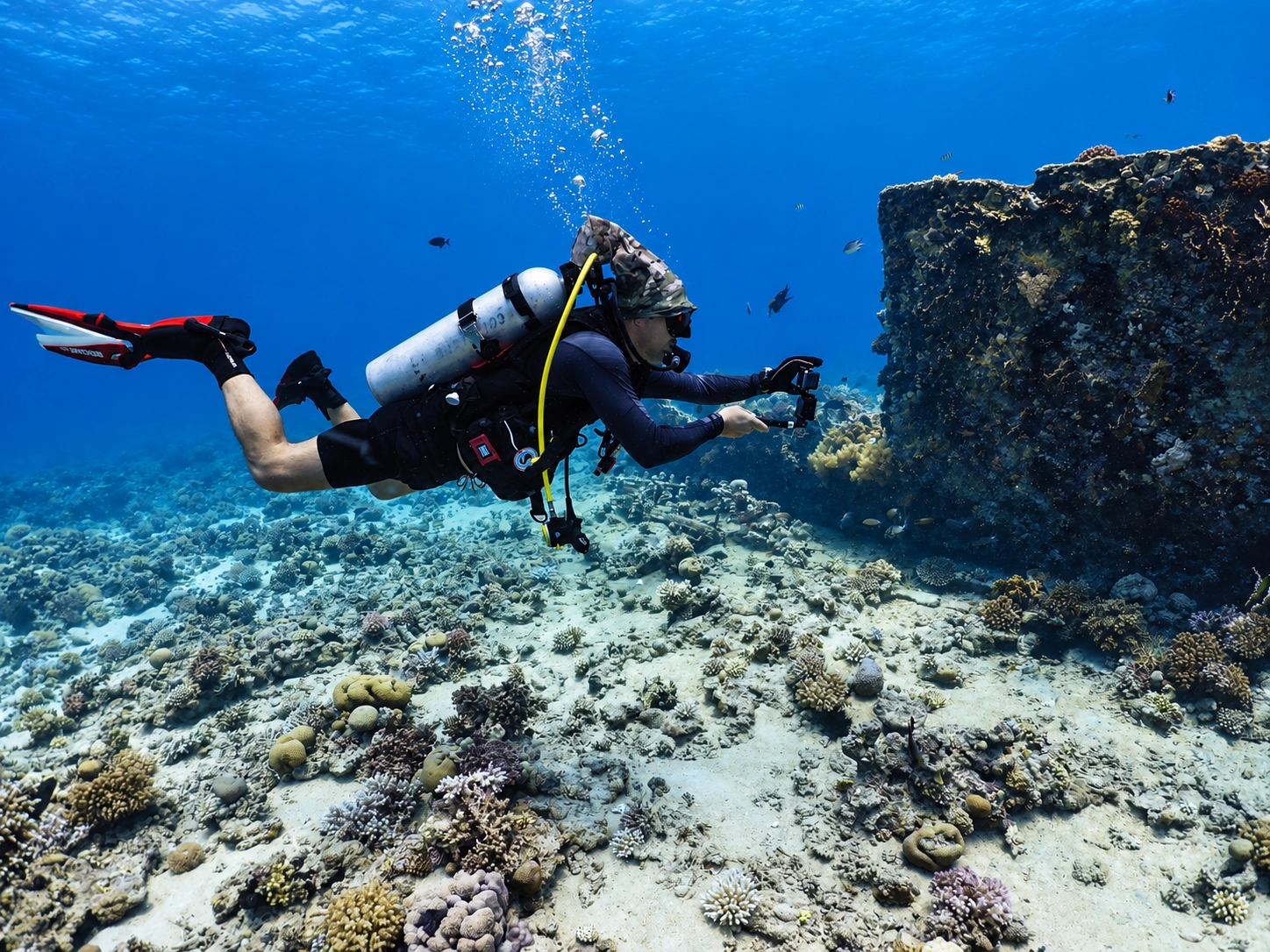 Camera work beside a sunken hull