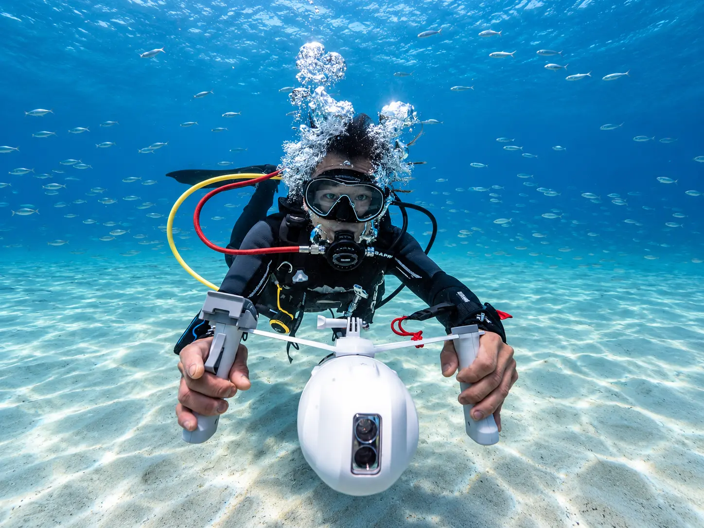 Student under power in blue water on the Red Sea