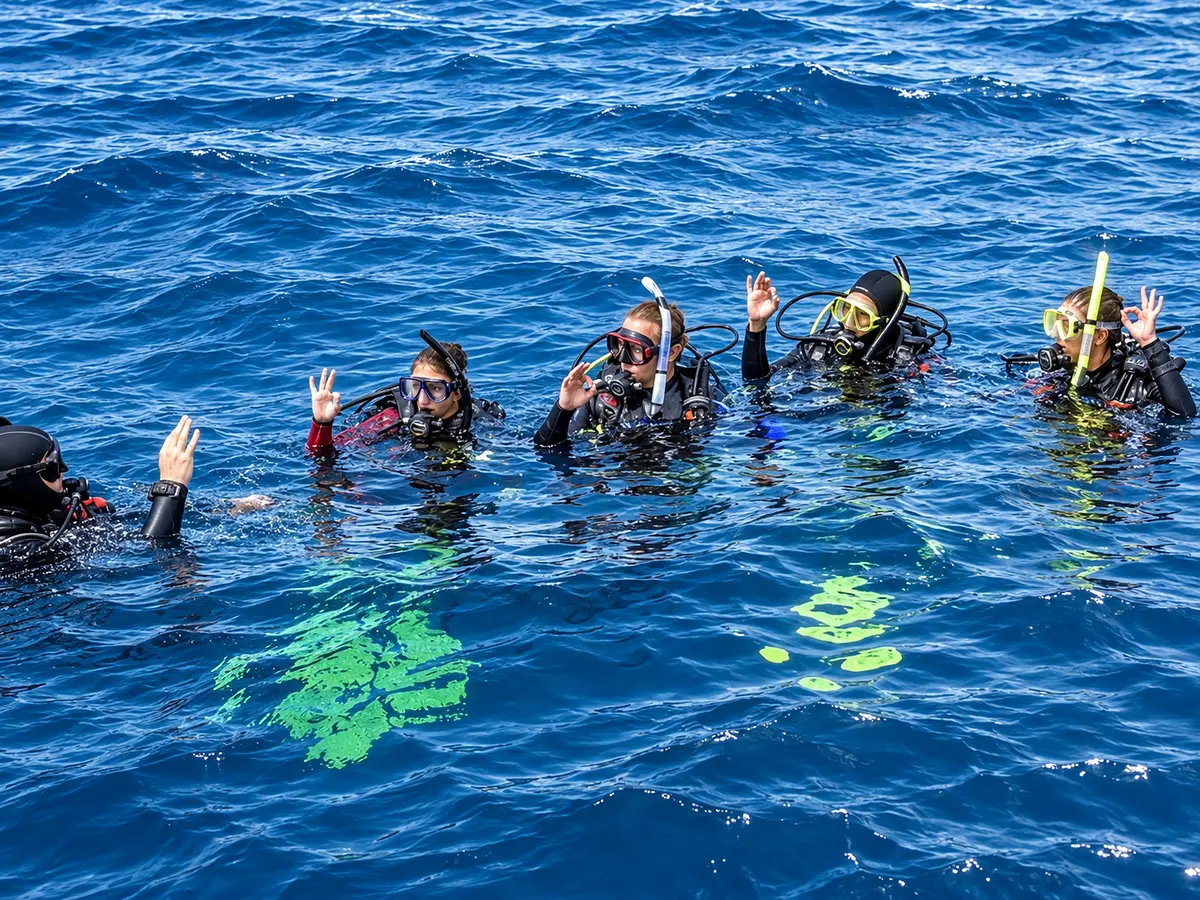Students practicing open water skills at the surface in Hurghada